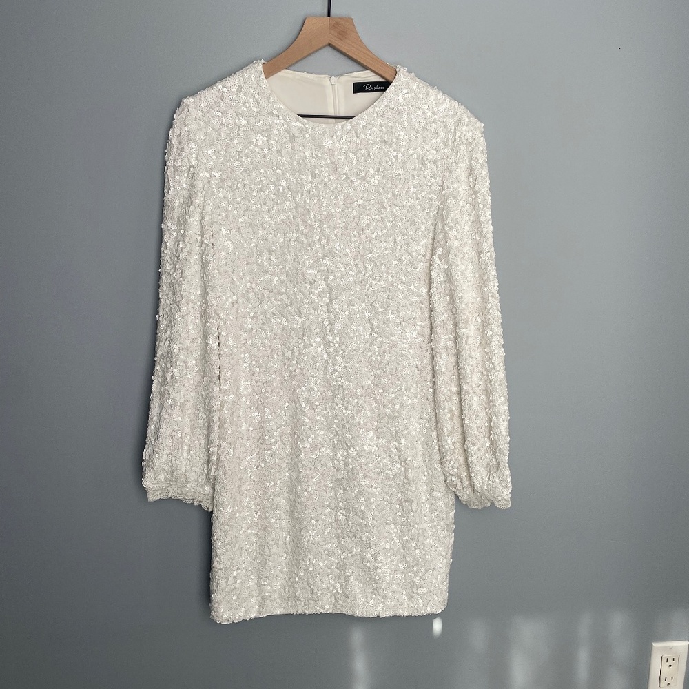 Never worn! Above the knee, white, long sleeved, sequence dress